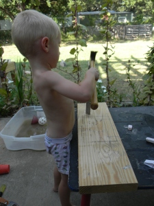 My Dad sent me some chisels and a plane. Young Grasshopper was really excited to try them out.